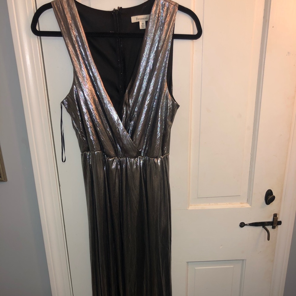 Francesca’s silver jump suit ,  size medium